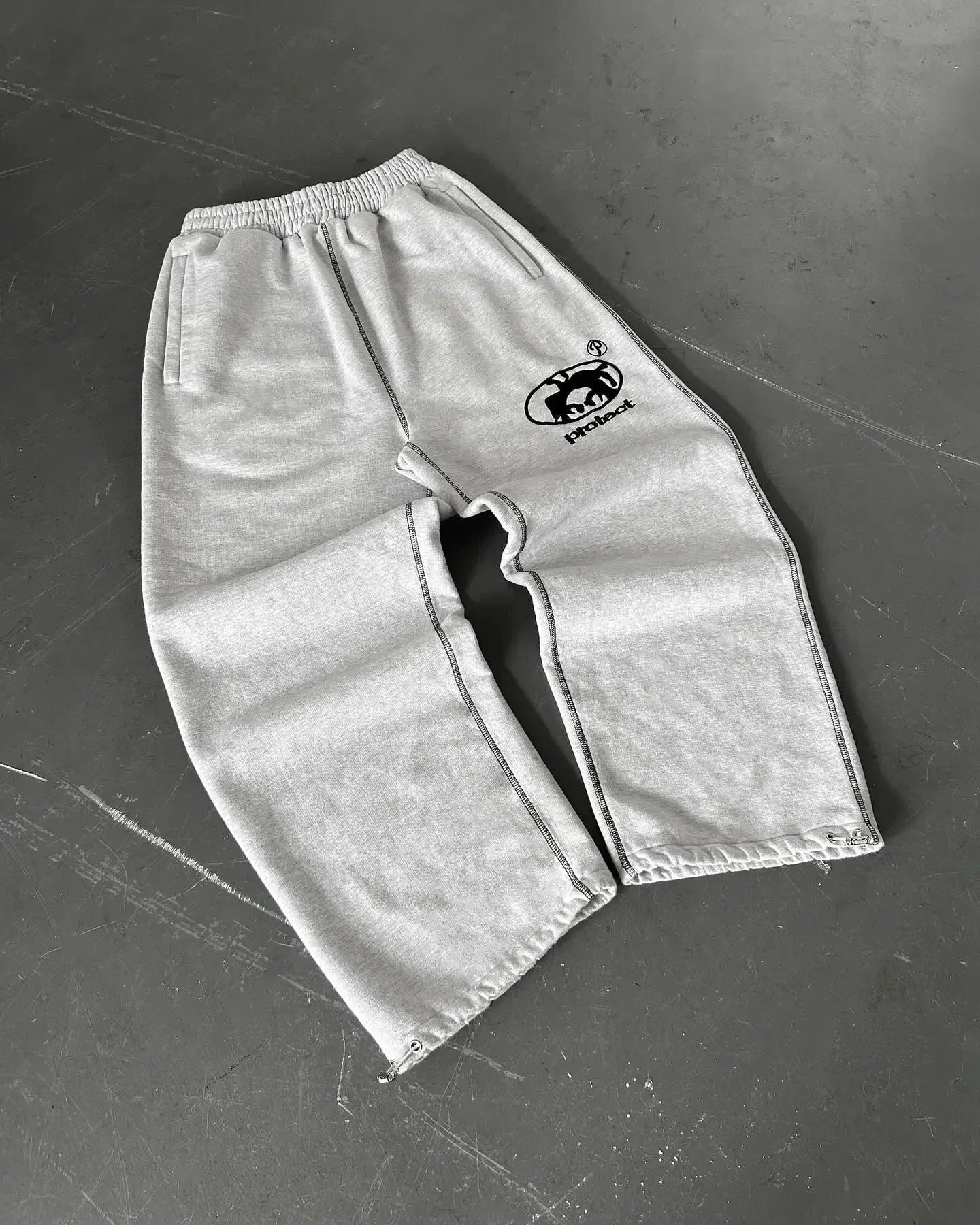 "Protect" Baggy Joggers - Casual Streetwear Pants for a Trendy Look